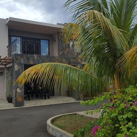 Aux Plaisirs De La Vie Chambre Chez L Habitant Flic en Flac Bagian luar foto